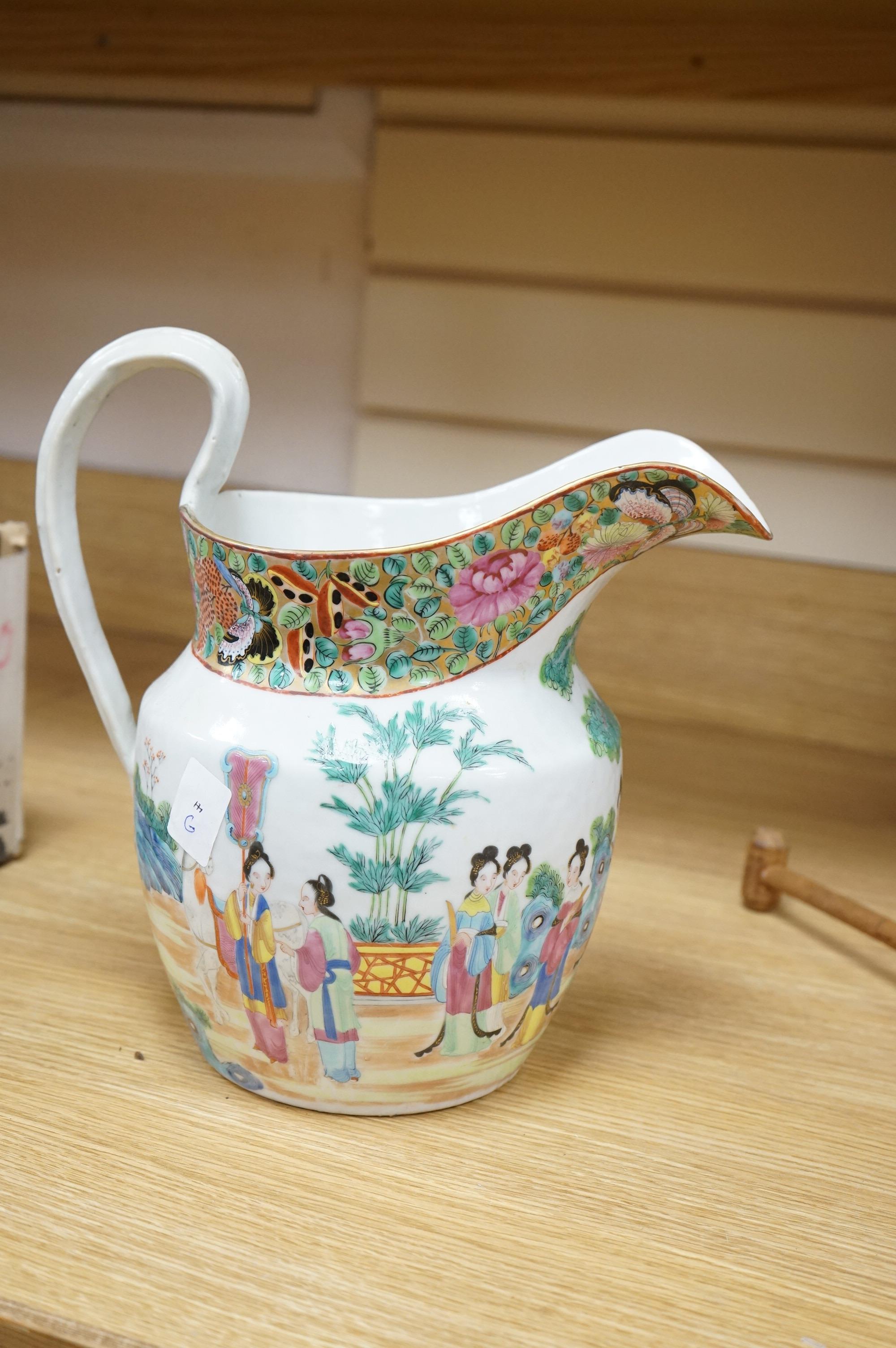 A Chinese famille rose jug, c.1830, 27cm